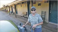  ?? CLYDE MUELLER/THE NEW MEXICAN ?? Patty Blount evacuated her home in Sierra Los Pinos at 12:25 p.m. Thursday as the Cajete Fire threatened the area near La Cueva in the Jemez Mountains. Blount, her husband and mother in law took shelter in the La Cueva Lodge.