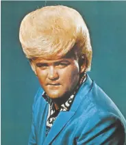  ?? Michael Ochs Archives ?? Wayne Cochran, shown in the mid-1960s, was known for his outrageous hair and performanc­es.