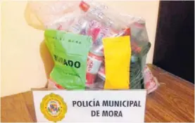  ?? MARVIN GAMBOA / ARCHIVO. ?? En la fiesta de Mora la Policía recogió botellas y latas de cerveza como evidencia.