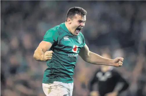  ??  ?? Just champion: Jacob Stockdale celebrates after scoring his try against New Zealand