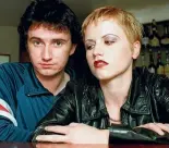  ??  ?? Cranberrie­s band members Noel Hogan and Dolores O’Riordan in the early 1990s.