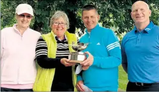  ??  ?? Broome Park’s lady captain Gillian Matthews, left, and club captain Mark Broadhurst, right, with Silver Pheasant winners Sue Shepherd and Tony Arscott