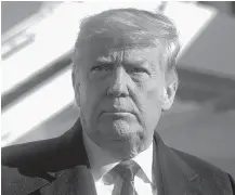  ?? REUTERS ?? U.S. President Donald Trump prepares to board Air Force One to depart Washington on Jan. 12.