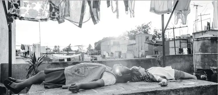 ?? NETFLIX ?? Netflix is giving Mexican director Alfonso Cuaron’s semi-autobiogra­phical film Roma limited release in theatres in Canada. The movie begins streaming Dec. 14.