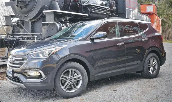  ?? — PHOTOS: DEREK MCNAUGHTON/DRIVING.CA ?? The Hyundai Santa Fe Sport offers plenty of space for passengers and cargo and good fuel economy.