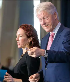  ?? Arkansas Democrat-Gazette/BENJAMIN KRAIN ?? Former President Bill Clinton introduces Catherine Finn, deputy editor of Harvard Health Publicatio­ns, during the Clinton Foundation’s sixth annual Health Matters Activation Summit on Monday at the Clinton Presidenti­al Center in Little Rock.