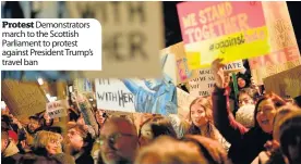  ??  ?? Protest Demonstrat­ors march to the Scottish Parliament to protest against President Trump’s travel ban