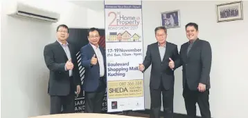  ??  ?? Members of the organising committee of Sheda Kuching Branch Home and Property Roadshow 2017 poising beside a banner of the event. From left is Tan, Sim, Richard, and Barapui.
