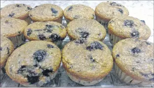  ?? CYNTHIA STONE PHOTO ?? Making your own muffins will save you dollars on coffee shop treats. Bake, wrap and freeze fresh muffins for a quick grab-and-go snack and put those extra dollars saved to work elsewhere.