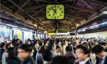  ??  ?? A crowded train platform at Shinjuku station in Tokyo. Photograph: P Batchelder/Alamy