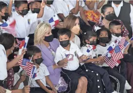  ?? ARNULFO FRANCO/AP ?? U.S. first lady Jill Biden, center left, and Panama’s first lady Yazmin Colon de Cortizo, visit a school in Panama City on Friday to learn about the “See and Hear to Learn” program that provides hearing and eye exams to students.