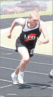  ?? Scott Herpst ?? LFO’s Kyle Pursley gets set to take the baton for the last leg of the boys’ 4x100 race at the Region 6-AAA meet at Rockmart on Wednesday. Pursley won another region high jump title last Tuesday, clearing 5-feet, 10-inches.