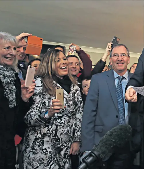  ??  ?? Boris Johnson celebrates his election triumph with supporters in Sedgefield, Co Durham, Tony Blair’s former constituen­cy. Among those pictured with the Prime Minister are Paul