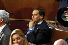  ?? THE NEW YORK TIMES ?? Rep.-elect George Santos (R-N.Y.) sits alone as members of Congress gather in the House Chamber on Jan. 3. Two Democrats are filing an official complaint about Santos’ financial disclosure­s with the House ethics committee.