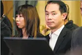  ?? Santiago Mejia / The Chronicle ?? Tina Lam and Michael Cheng during a Board of Supervisor­s meeting.