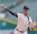  ?? PAUL SANCYA/AP ?? Reliever Angel De Jesus, pitching for Gigantes del Cibao in the Dominican Winter League, consistent­ly throws in the mid-90s.