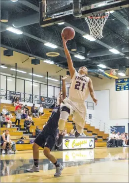  ?? Courtesy photo ?? Trinity Classical Academy sophomore Kyle Fields attempts a layup in the team’s 93-29 win over Frazier Mountain at College of the Canyons earlier this month.