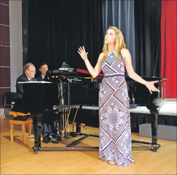  ??  ?? Lara Rebekah Harvey gives an animated performanc­e of Cole Porter’s ‘The Oyster Song’ accomponie­d by Roderick Barrand.