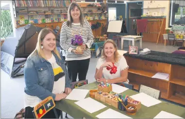  ??  ?? READY, SET, GO: Horsham’s Natimuk Road Kindergart­en staff, from left, Lucy Mckinnon, Jennie Emmerson and teacher Kylie Donnell, are well prepared for term two activities. Picture: PAUL CARRACHER