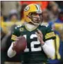  ?? MIKE ROEMER — THE ASSOCIATED PRESS ?? The Atlanta Falcons defense is tasked to control the redhot Green Bay Packers and quarterbac­k Aaron Rodgers in the NFC Championsh­ip game today.