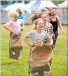  ?? Photo / LBD Photograph­y ?? Sack races are among the fun activities children can take part in during the Interislan­der Summer Festival Taupo¯ Races, which are held on Sunday December 30.