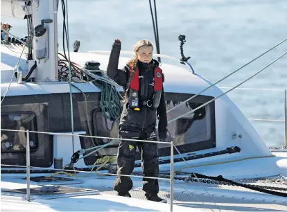  ??  ?? Greta Thunberg an Bord des Katamarans La Vagabonde, mit dem sie den Atlantik überquert hat. Die 16-Jährige kam am Dienstag in Lissabon an und reist weiter nach Madrid zum Klimagipfe­l.