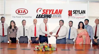  ??  ?? Kia Motors Assistant Sales Manager Trevor Perera, Senior Executive Sales and Marketing Lerain Wijeratne, General Manager Sales and Marketing Darshan Senaratne, Executive Director/coo Andrew Perera, Managing Director Mahen Thambiah, Assistant Sales...