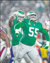  ?? Matt Slocum The Associated Press ?? Eagles defensive end Brandon Graham celebrates after a sack of Bills quarterbac­k Josh Allen on Sunday.