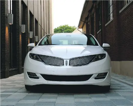  ?? PHOTOS: JOHN LEBLANC/ DRIVING ?? If you’re partial to cool exterior styling and a powerful V6 engine, the 2015 Lincoln MKZ could be the luxury car for you.