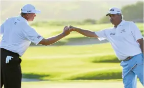  ??  ?? Ernie Els [left] and Fred Couples during the final round of the 2020 Mitsubishi Electric Championsh­ip
