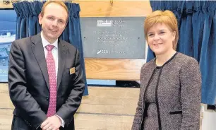  ??  ?? PAY RISE SSE chief executive Alistair Phillips-Davies with FM Nicola Sturgeon