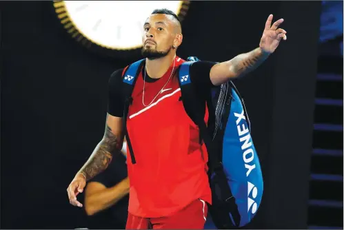  ?? (File Photo/AP/Hamish Blair) ?? Nick Kyrgios of Australia gestures Thursday as he walks from Rod Laver Arena following his second round loss to Daniil Medvedev of Russia at the Australian Open tennis championsh­ips in Melbourne, Australia.