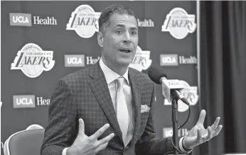  ?? AP Photo/Reed Saxon ?? ON LEBRON, ETC. Los Angeles Lakers general manager Rob Pelinka talks about the acquisitio­n of LeBron James and other free agents at a news conference at the NBA basketball team's headquarte­rs in El Segundo, Calif., Wednesday, July 11, 2018.