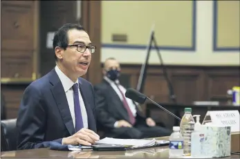  ?? GRAEME JENNINGS — POOL VIA AP, FILE ?? In this Sept. 1photo, Treasury Secretary Steven Mnuchin testifies before the House Select Subcommitt­ee on the Coronaviru­s Crisis, during a hybrid hearing on Capitol Hill in Washington. The federal budget deficit hit an all-time high of $3.1trillion in the 2020budget year, more than double the previous record, as the coronaviru­s pandemic shrank revenues and sent spending soaring. The Trump administra­tion reported Friday, Oct. 16, that the deficit for the budget year that ended on Sept. 30was three times the size of last year’s deficit of $984billion.