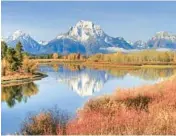  ?? DREAMSTIME ?? Enjoy Grand Teton National Park in Wyoming for the changing leaves and extraordin­ary autumn beauty.