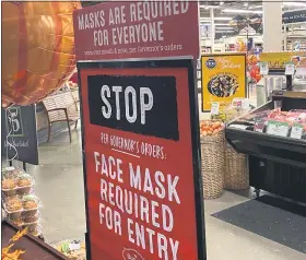  ?? STEPHEN FRYE— MEDIANEWS GROUP ?? A store sign tells customers to wear a mask.