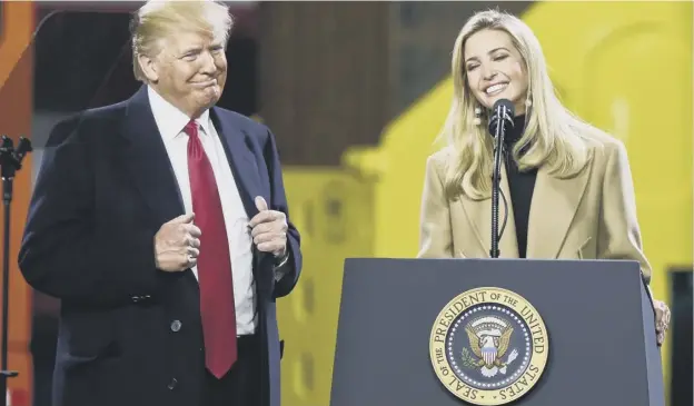  ?? PICTURE; AP ?? President Donald Trump stands beside his daughter Ivanka yesterday as his second year of office dawns