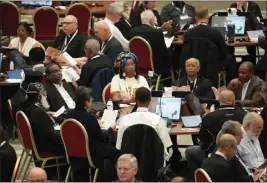  ?? GREGORIO BORGIA — THE ASSOCIATED PRESS ?? Participan­ts of the 16th General Assembly of the Synod of Bishops gather in the Paul VI hall at the Vatican on Thursday. Pope Francis is convening a global gathering of bishops and laypeople to discuss the future of the Catholic Church. The Synod of Bishops runs through cot. 29.