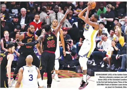  ??  ?? KEVIN DURANT (#35) of the Golden State Warriors attempts a jumper over Jeff Green (#32) of the Cleveland Cavaliers in the first half during Game Three of the 2018 NBA Finals at Quicken Loans Arena on June 6 in Cleveland, Ohio.