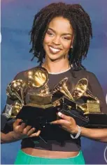  ?? REED SAXON AP ?? In 1999, Lauryn Hill became the first rapper to win the Grammy Award for Album of the Year.