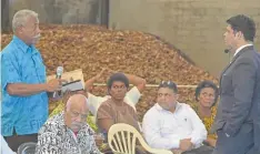  ?? Photo: Shratika Naidu ?? Isaia Nainoca (left) speaks to the Atotrney-General and Minister for Economy Aiyaz Sayed-Khaiyum at the Budget Roadshow in Savusavu on August 13, 2018.