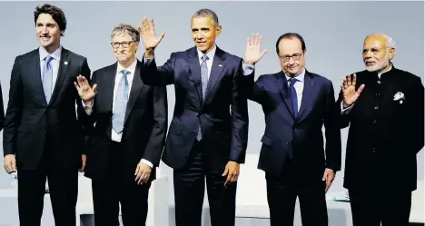  ?? IAN LANGSDON/VIA THE ASSOCIATED PRESS ?? From left, Prime Minister Justin Trudeau stands with Microsoft CEO Bill Gates, U.S. President Barack Obama, French President Francois Hollande and Indian Prime Minister Narendra Modi at the United Nations Climate Change Conference on Monday.
