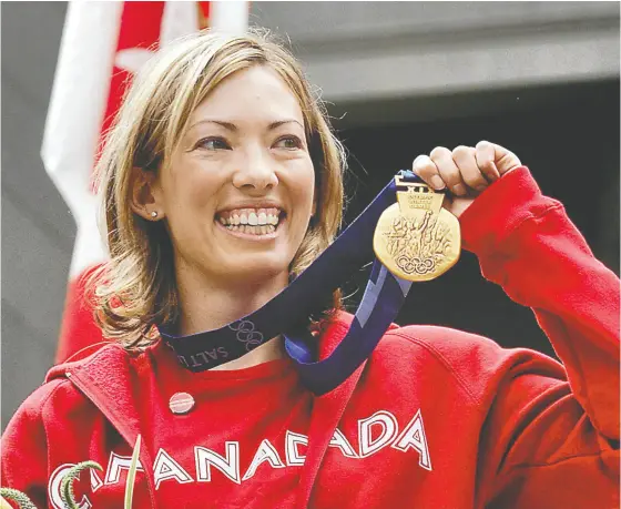  ?? CHRIS BOLIN / THE CANADIAN PRESS FILES ?? Cross-country skier Beckie Scott was the first North American woman to win Olympic gold in her sport — after the two Russian competitor­s who crossed the finish line ahead of her at the 2002 Olympics in Salt Lake City were stripped of their medals for doping.