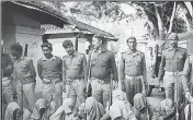  ?? HT FILE ?? ■ Arrested Naxalites with police near Hilsa in the Nalanda district of Bihar on 23 November 1985.