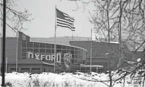  ?? RYAN GARZA/DETROIT FREE PRESS ?? Four teenagers died and seven people were injured at Oxford High School in Michigan when a gunman fired what sheriff’s deputies now believe to be 30 shots Tuesday afternoon.
