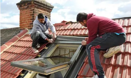  ?? ?? Loft extensions are expected to go up in price as new regulation­s set higher standards for glazing and other materials. Photograph: Simon Turner/Alamy