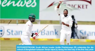  ?? — AFP ?? POTCHEFSTR­OOM: South African bowler Andile Phehlukway­o (R) celebrates the dismissal of Bangladesh batsman Tamim Iqbal (L) during the third day of the first Test cricket match between South Africa and Bangladesh in Potchefstr­oom yesterday.