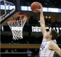  ?? KEITH SRAKOCIC — THE ASSOCIATED PRESS ?? Duke’s Grayson Allen goes up for a dunk during tournament victory over Iona, Thursday in Pittsburgh.