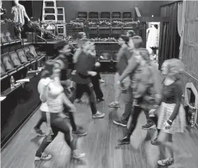  ?? ?? Cast and crew rehearse a Regency Era dance on Nov. 28 for Oklahoma Shakespear­e in the Park’s production of “Jane Austen’s Christmas Cracker” in Oklahoma City.