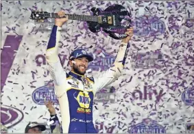  ?? Christophe­r hanewincke­l ?? NASCAR Cup Series driver Chase Elliott (9) celebrates in victory lane after winning the Ally 400 at Nashville Superspeed­way on Sunday.